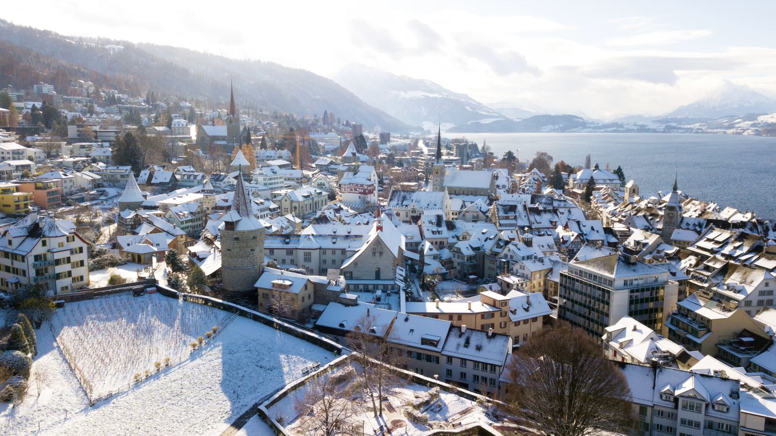The old town of Zug and Lake Zug in winter